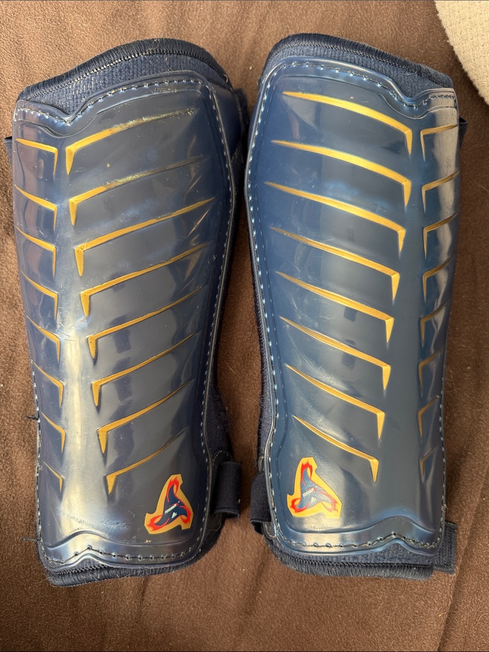 Navy Blue Adidas Shin Guards with Yellow Accents